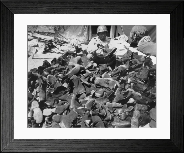 Framed Print : African American Pfc. Robert Askew with the 3278th Quartermaster Company in Italy. He is engaged in a non-combat task of maintaining overshoes used by combat troops