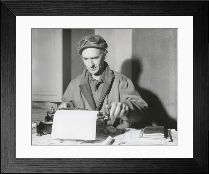 Framed Print : Ernie Pyle, war correspondent, at his typewriter while reporting from the Anzio Beachhead, Italy. (BSLOC_2014_8_220)
