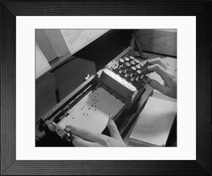 Framed Print : Close up of mechanism used to make precise holes on computer punch cards at U.S. Bureau of the Census, ca. 1940. (BSLOC_2013_8_184)