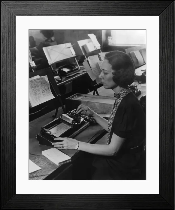 Framed Print : U.S. Census worker transferring information from a questionnaire to a punch card, ca. 1940. (BSLOC_2013_8_183) Framed Print : U.S. Census worker transferring information from a questionnaire to a punch card, ca. 1940. (BSLOC_2013_8_183)