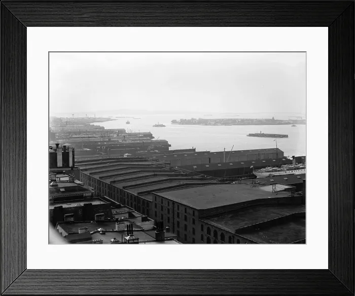 Framed Print : Warehouses line the Brooklyn shore of New York Harbor. View south includes Governor's Island in the mid-ground and Staten Island in the distance.Ca. 1912. LC-D4-15713