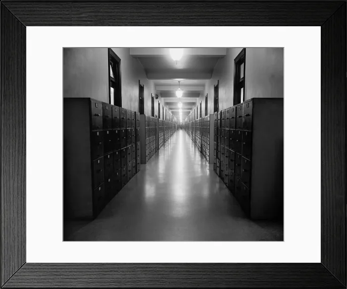 Framed Print : U.S. Government hallway lined with file cabinets, ca. 1937. (BSLOC_2013_8_179)