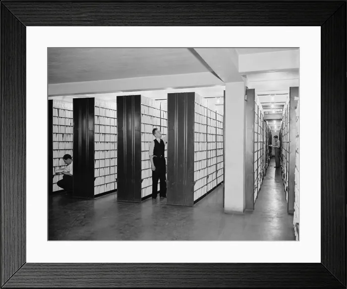 Framed Print : Federal workers in the patent office file room, where patents are kept on file for public use. Feb. 29, 1940. (BSLOC_2013_8_177) Framed Print : Federal workers in the patent office file room, where patents are kept on file for public use. Feb. 29, 1940. (BSLOC_2013_8_177)