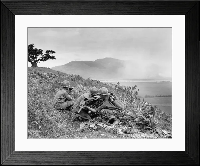 Framed Print : U.S. soldiers knocking out a machine gun nest of the Communists with their 57-mm gun. 24th Infantry Division. Ca. 1953. Korean War, 1950-53. (BSLOC_2014_11_127)