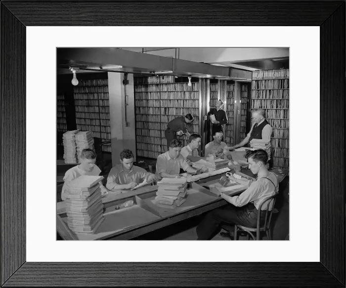 Framed Print : Federal workers in the patent office file room, where patents are kept on file for public use. Feb. 29, 1940. (BSLOC_2013_8_176) Framed Print : Federal workers in the patent office file room, where patents are kept on file for public use. Feb. 29, 1940. (BSLOC_2013_8_176)