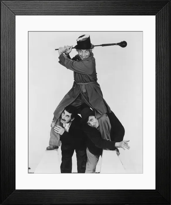 Framed Print : AT THE CIRCUS, Harpo Marx (top), bottom from left: Groucho Marx, Chico Marx, 1939