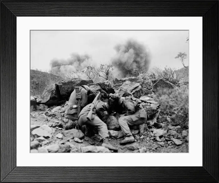 Framed Print : U.S. soldiers behind rocks to shield themselves from exploding mortar shells, near the Hantan River in central Korea. April 11, 1951 Framed Print : U.S. soldiers behind rocks to shield themselves from exploding mortar shells, near the Hantan River in central Korea. April 11, 1951