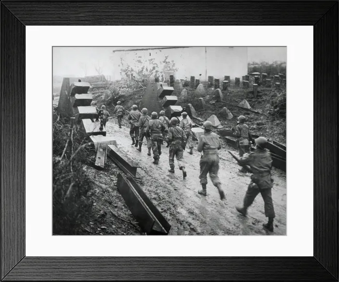 Framed Print : U.S. troops moving through dragon's teeth of the West Wall (Siegfried Line) fortifications. By Feb. 23, 1945 two corps of the U.S Framed Print : U.S. troops moving through dragon's teeth of the West Wall (Siegfried Line) fortifications. By Feb. 23, 1945 two corps of the U.S