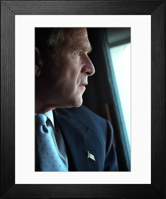 Framed Print : President George W. Bush surveys the damage to the Pentagon from Marine One, Sept. 14, 2001