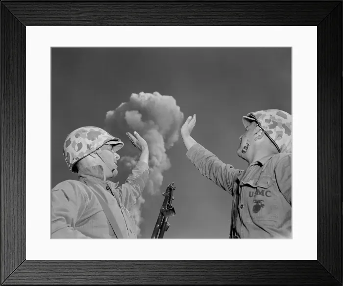 Framed Print : Soldiers pose below an atomic cloud at the Nevada Proving Ground. Soldiers conducted maneuvers in the vicinity of nuclear tests in 1951. (BSLOC_2015_2_15)