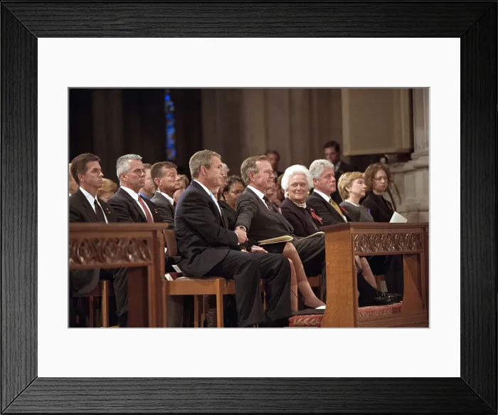 Framed Print : President George W. Bush grasps the hand of his father, former President George H. W. Bush