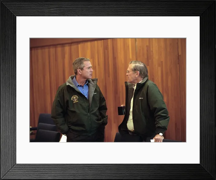 Framed Print : Pres. George W. Bush with Sec. of Defense Donald Rumsfeld, Sept. 15, 2001. They are on a break during a National Security Council meeting at Camp David in Thurmont, Maryland