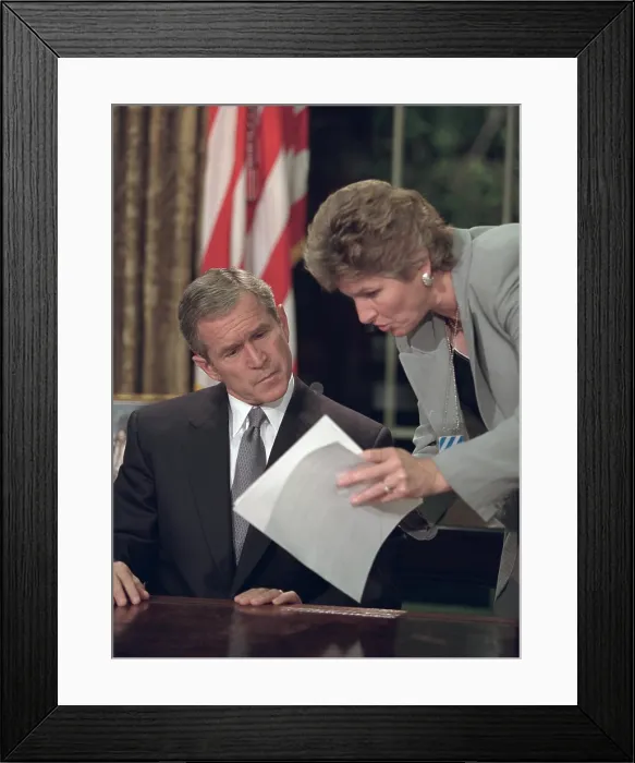 Framed Print : President George W. Bush reviews notes with Karen Hughes before speaking from the Oval Office