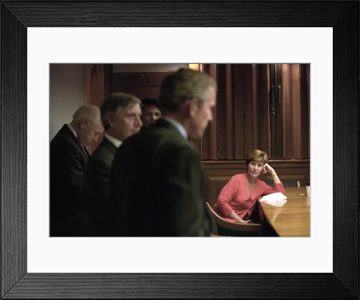 Framed Print : First Lady Laura Bush in the White House Emergency Operations Center, Sept. 11, 2001. She listens as President George W