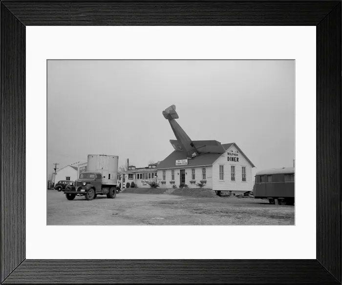 Framed Print : William Penn Diner on Route 40, Delaware, April 1939. The diner was close to the local airport and the airplane crashed into the roof is fake. Photo by Arthur Rothstein