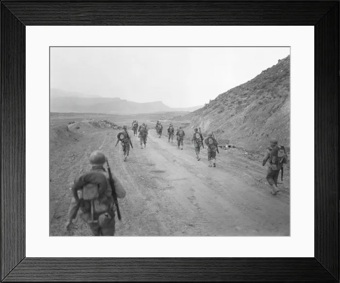 Framed Print : U.S. 94th Tank Destroyer Group in the Kasserine Pass, Tunisia. On Feb. 25, 1943 a reconnaissance group returns to the scene of the Allied defeat of Feb. 19-24, 1943. World War 2 Framed Print : U.S. 94th Tank Destroyer Group in the Kasserine Pass, Tunisia. On Feb. 25, 1943 a reconnaissance group returns to the scene of the Allied defeat of Feb. 19-24, 1943. World War 2