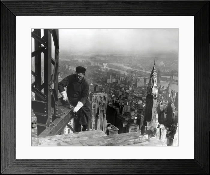 Framed Print : Middle aged iron worker at the Empire State Building construction site, 1930. The Chrysler Building's spire is at right. Photo By Lewis Hine. (BSLOC_2013_8_226)