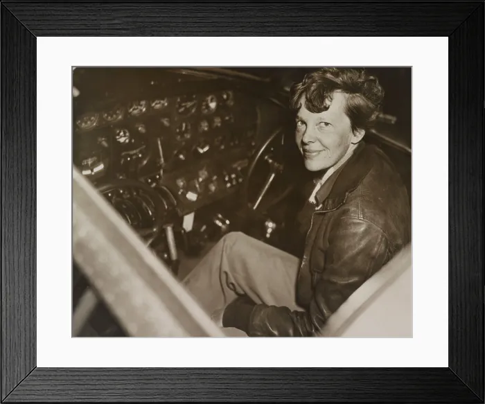 Framed Print : Amelia Earhart sitting in the cockpit of her Lockheed Electra airplane, ca. 1936. In July 1937 Earhart and the airplane were lost over the Pacific Ocean. (BSLOC_2013_8_213) Framed Print : Amelia Earhart sitting in the cockpit of her Lockheed Electra airplane, ca. 1936. In July 1937 Earhart and the airplane were lost over the Pacific Ocean. (BSLOC_2013_8_213)
