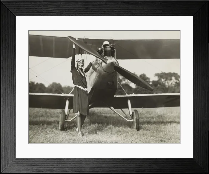 Framed Print : Amelia Earhart, turning the propeller of the sports plane she bought in 1928. The plane was previously owned by Mary, Lady Heath, an Irish aviatrix