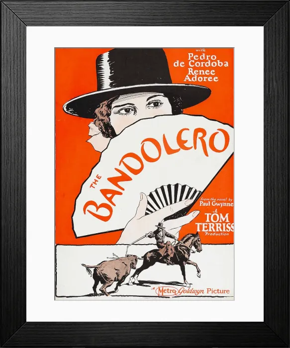 Framed Print : THE BANDOLERO, Renee Adoree holding a fan, 1924