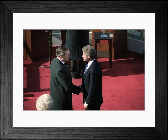 Framed Print : Outgoing President George H.W. Bush and incoming President Bill Clinton. Jan. 20, 1993. They shake hands just after the inaugural ceremonies at the U.S. Capitol