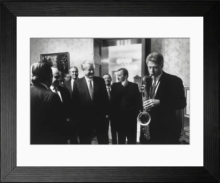 Framed Print : President Bill Clinton plays the saxophone presented to him by Russian President Boris Yeltsin. Yeltsin hosted a private dinner at Novoya Ogarova Dacha, Russia. Jan Framed Print : President Bill Clinton plays the saxophone presented to him by Russian President Boris Yeltsin. Yeltsin hosted a private dinner at Novoya Ogarova Dacha, Russia. Jan