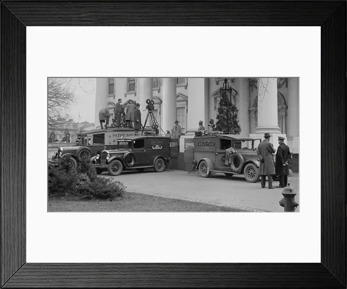 Framed Print : Three new sound move trucks at the White House, on Dec. 26, 1929. Trucks and cameramen are from Pathe, Paramount, and Movetone (Fox News)
