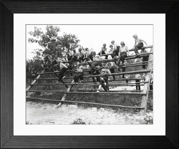 Framed Print : U.S. Women's Army Corps nurses in basic training. The WACs climb a log ladder on the obstacle course at Camp Blanding, Fla. Oct. 1, 1943. World War 2. (BSLOC_2014_10_196)