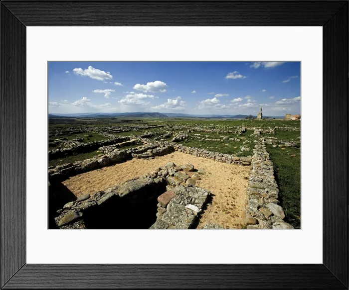Framed Print : SPAIN. Garray. View of the Celtiberian-Roman archaeological site. In the background, the two city commemorative monoliths Framed Print : SPAIN. Garray. View of the Celtiberian-Roman archaeological site. In the background, the two city commemorative monoliths