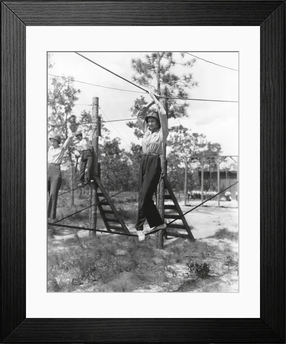 Framed Print : U.S. Women's Army Corps nurses in basic training. The WACs walk a tight rope on the obstacle course at Camp Blanding, Fla. Oct. 1, 1943. World War 2. (BSLOC_2014_10_197)