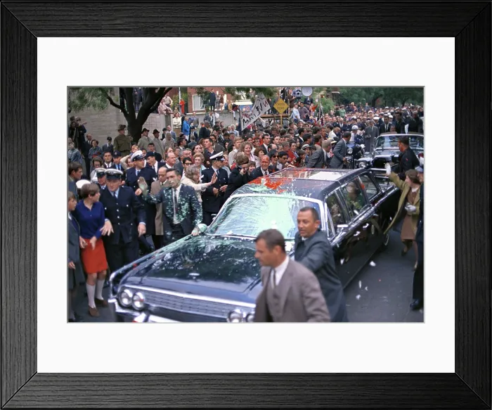 Framed Print : Motorcade of President Lyndon Johnson attacked by anti-Vietnam War protesters in Melbourne, Australia. Protesters threw paint on the car, police and Secret Service agents on Oct