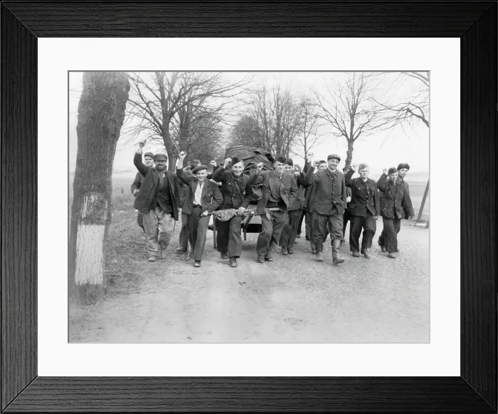 Framed Print : Liberated Russians, slave laborers and soldiers, head away from the battle front to France. Near St. Ingbert, Germany. March 21, 1945, World War 2. (BSLOC_2014_10_185) Framed Print : Liberated Russians, slave laborers and soldiers, head away from the battle front to France. Near St. Ingbert, Germany. March 21, 1945, World War 2. (BSLOC_2014_10_185)