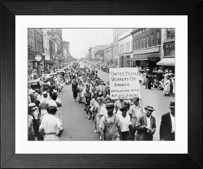Framed Print : Striking Southern textile workers celebrate Labor Day with a parade and sign announcing their affiliation with the American Federation of Labor in 1934. Gastonia, North Carolina