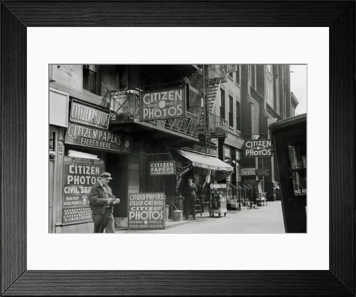 Framed Print : Small businesses catering to immigrants seeking naturalization and government documents. The street is near the NYC Federal Building where aliens seek citizenship. 1939