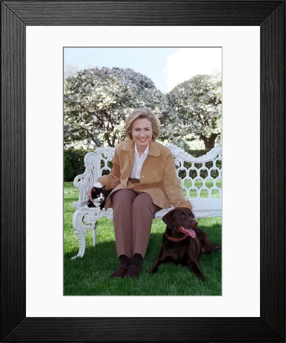 Framed Print : First Lady Hillary Rodham Clinton with Socks the Cat and Buddy the Dog on the White House Lawn. April 7, 1999. (BSLOC_2015_2_205) Framed Print : First Lady Hillary Rodham Clinton with Socks the Cat and Buddy the Dog on the White House Lawn. April 7, 1999. (BSLOC_2015_2_205)