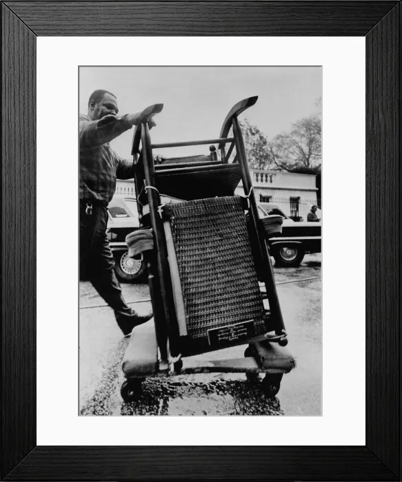Framed Print : President Kennedy's rocking chair moved from the White House on Nov. 23, 1963 Framed Print : President Kennedy's rocking chair moved from the White House on Nov. 23, 1963