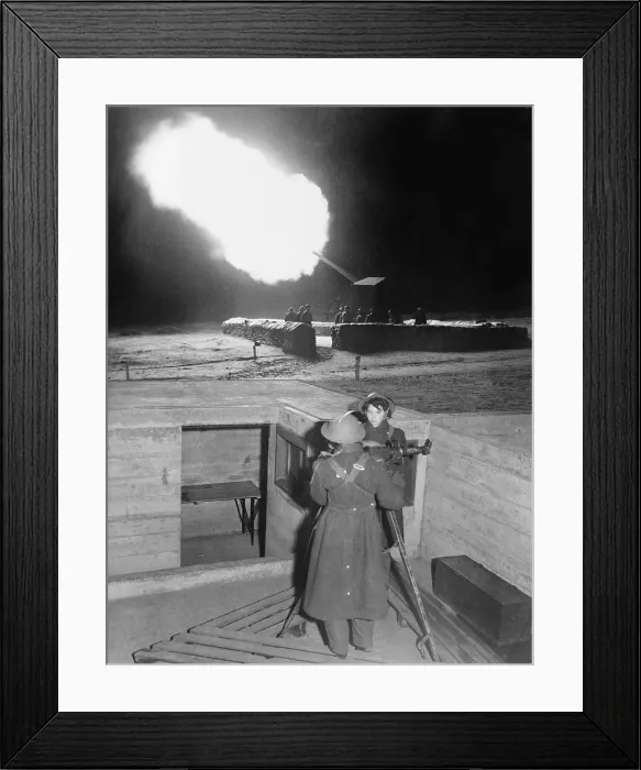 Framed Print : British enlisted women, gunner girls at night action station in 1940-41. They are next to anti-aircraft gun firing in near background