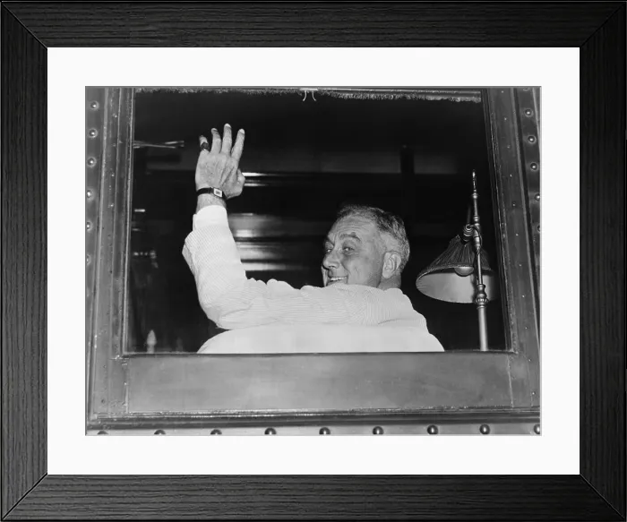 Framed Print : President Franklin Roosevelt, looking behind him, waving from his campaign train in Milwaukee. 1936. (BSLOC_2015_2_246)
