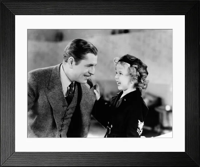 Framed Print : STAND UP AND CHEER!, from left: Warner Baxter, Shirley Temple, 1934, TM & Copyright 20th Century Fox Film Corp. / courtesy Everett Collection Framed Print : STAND UP AND CHEER!, from left: Warner Baxter, Shirley Temple, 1934, TM & Copyright 20th Century Fox Film Corp. / courtesy Everett Collection
