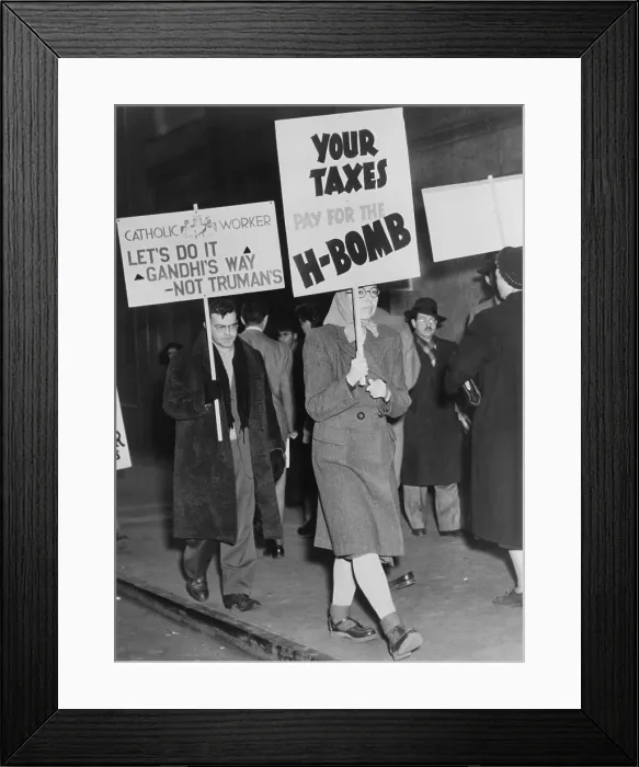 Framed Print : Men and women picketing against the use of tax dollars for the development of nuclear weapons. New York City, March 15, 1950. On Jan