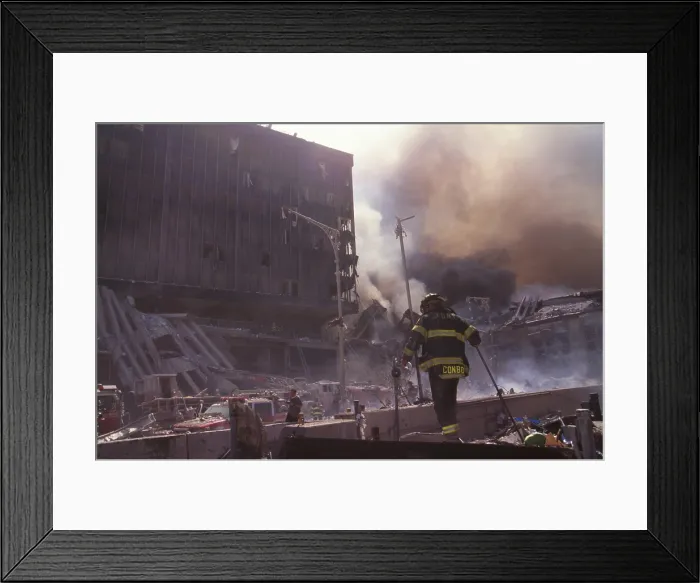 Framed Print : Fire fighters amid smoking rubble following September 11th terrorist attack on World Trade Center