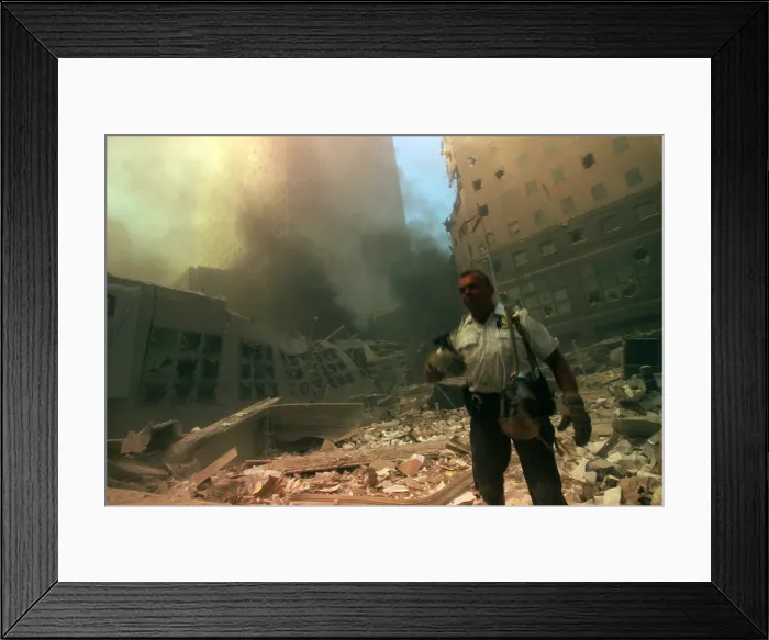 Framed Print : New York City policeman in ruins following September 11th terrorist attack on World Trade Center Framed Print : New York City policeman in ruins following September 11th terrorist attack on World Trade Center
