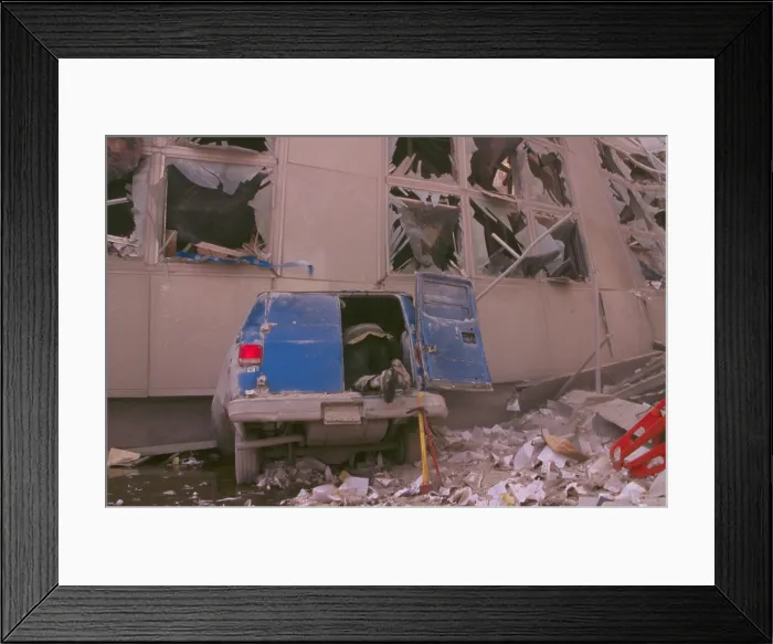 Framed Print : Fireman checking inside the back of a van after 9-11 terrorist attack in New York City