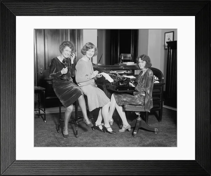 Framed Print : Fashionable young women in a Washington, D.C. office, May 1, 1929. One holds a telephone, another a stenographic pad, and the third sits at a typewriter. (BSLOC_2015_16_226) Framed Print : Fashionable young women in a Washington, D.C. office, May 1, 1929. One holds a telephone, another a stenographic pad, and the third sits at a typewriter. (BSLOC_2015_16_226)