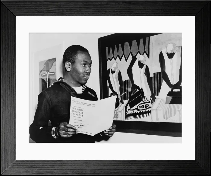 Framed Print : Coast Guardsman Jacob Lawrence, with his paintings at the Institute of Modern Art in Boston in 1945 Framed Print : Coast Guardsman Jacob Lawrence, with his paintings at the Institute of Modern Art in Boston in 1945