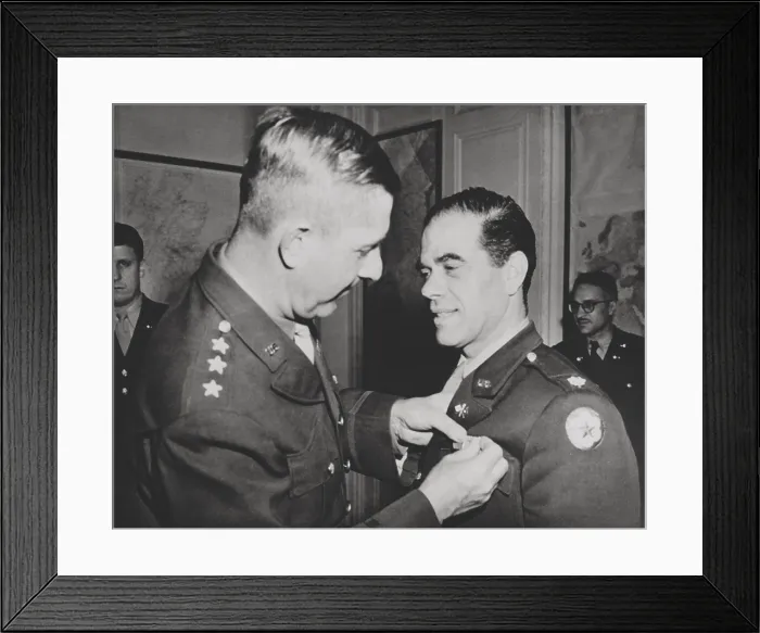 Framed Print : Lt. Col. Frank Capra, receives the Legion of Merit. The Hollywood movie director was chief of the U.S. Army Signal Corps motion picture production unit