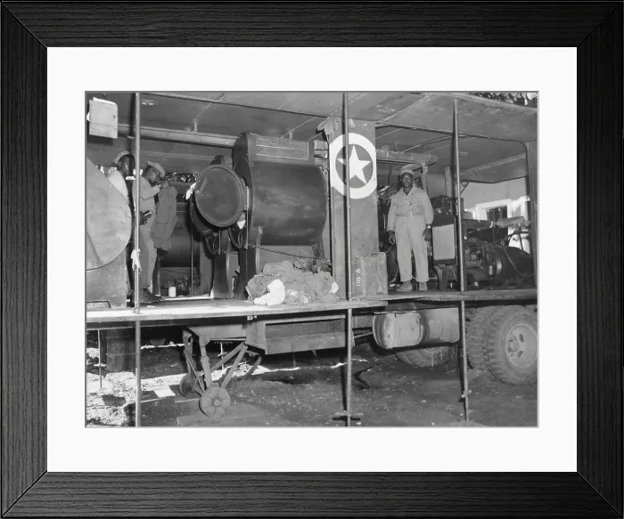 Framed Print : African American soldiers assigned to a mobile washing unit, of the 549th Quartermaster Laundry. They are with the Seventh Army, Poligny Area, France. Sept 22, 1944. World War 2