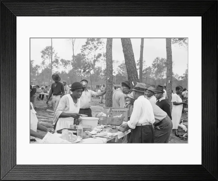 Framed Print : African American workmen having lunch, Newport News Homesteads, Virginia, Sept. 1936. Community women serve the lunch in the New Deal project built by and for African Americans Framed Print : African American workmen having lunch, Newport News Homesteads, Virginia, Sept. 1936. Community women serve the lunch in the New Deal project built by and for African Americans