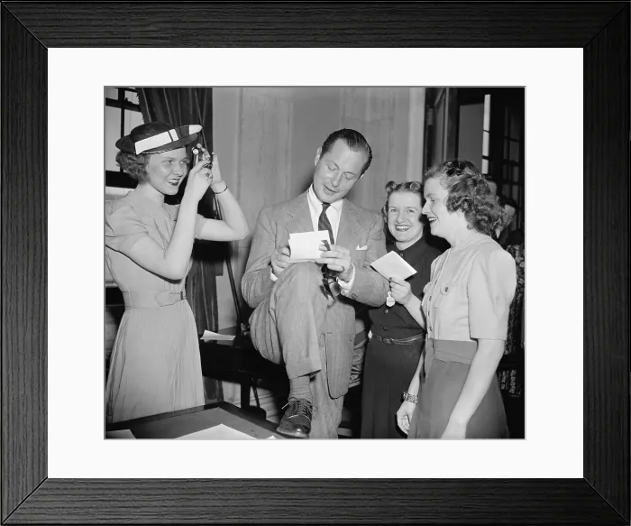 Framed Print : Screen actor Robert Montgomery, autographing for women fans at the U.S. Capitol Framed Print : Screen actor Robert Montgomery, autographing for women fans at the U.S. Capitol