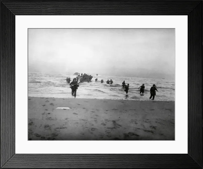 Framed Print : 143rd Infantry regiment Combat Team running onto a beach on the Gulf of Salerno, Italy. Sept. 9, 1943, World War 2. (BSLOC_2014_10_25)